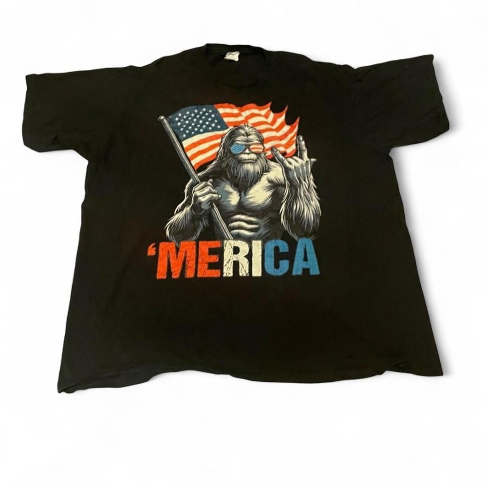 Black 'Merica Bigfoot graphic tee with American flag and 'MERICA text, size 2XL
